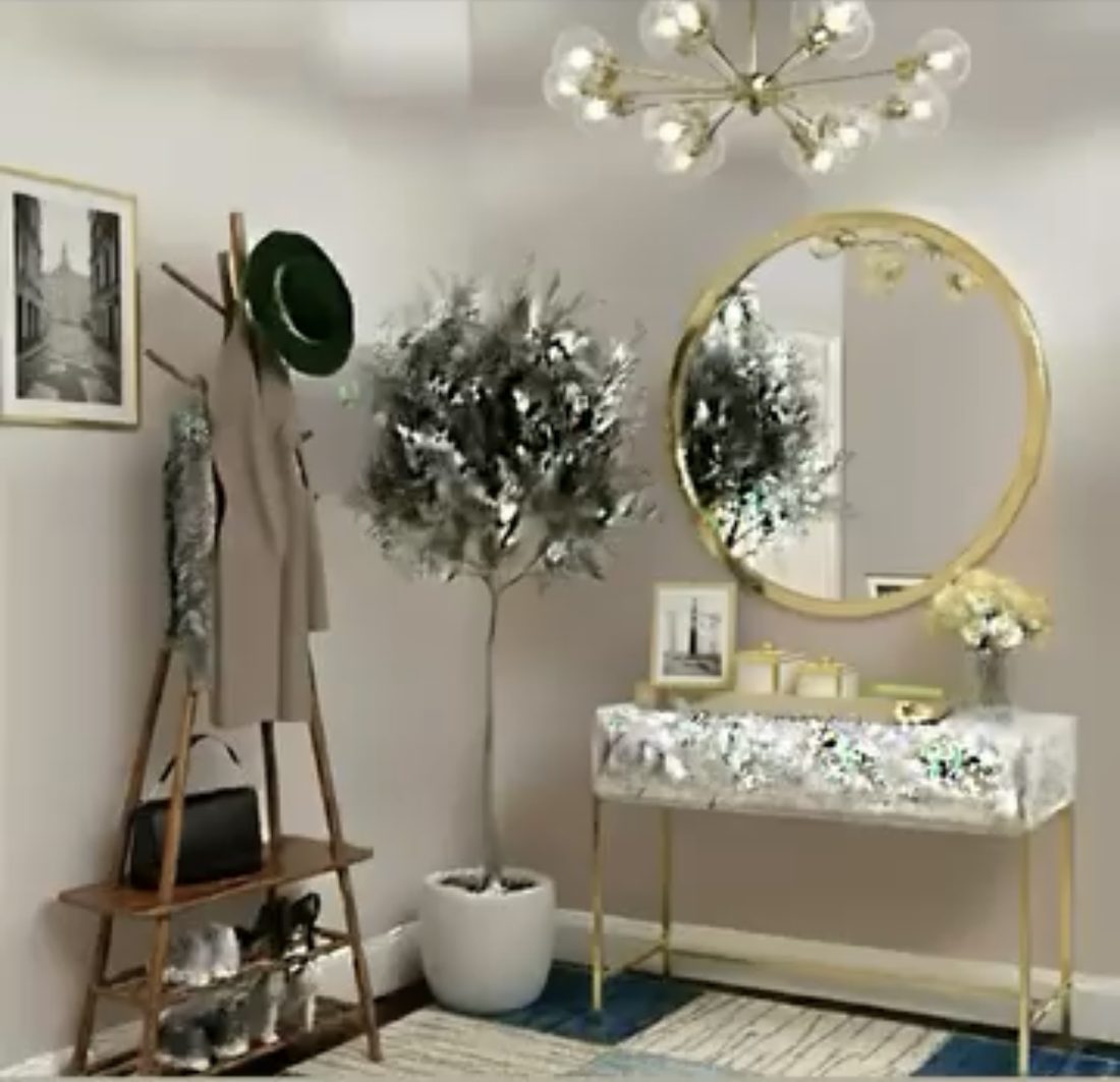 Entryway drop zone with coat rack, round gold mirror, console table and olive tree